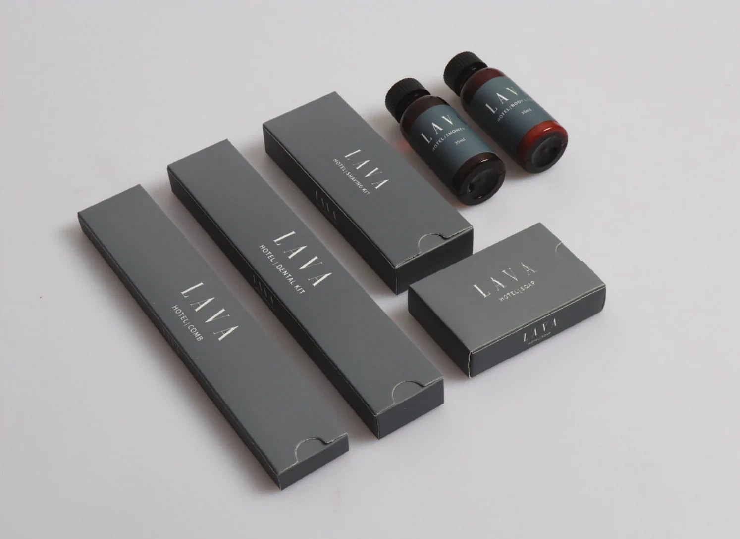 LAVA-branded in-suite amenity products — comb, dental kit, shaving kit, soap and bath amenities